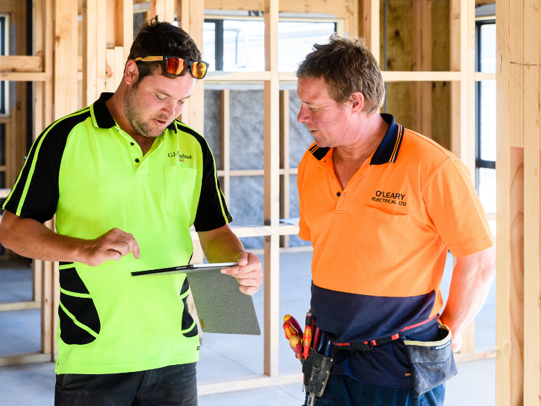 worker uising ipad to do a site review