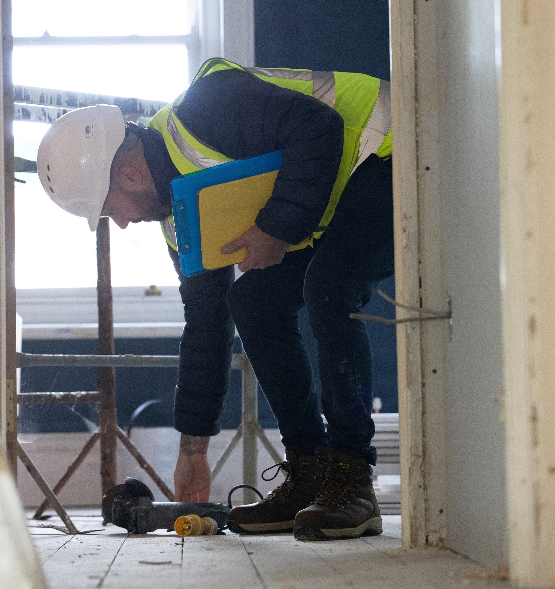 Construction worker spotting potential Hazards on site