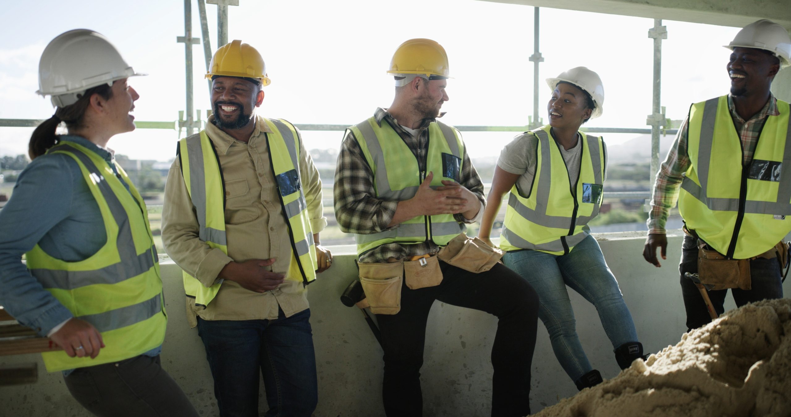 Construction workers having a chat on site